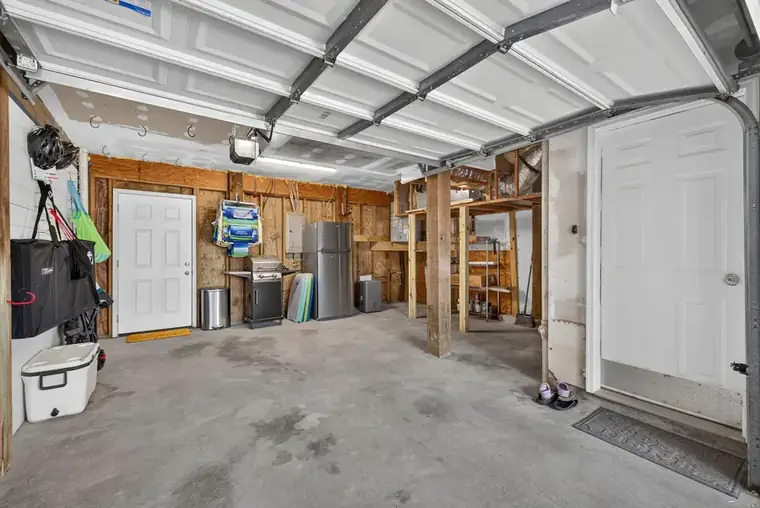 Enclosed garage with room for boards, bikes and beach gear