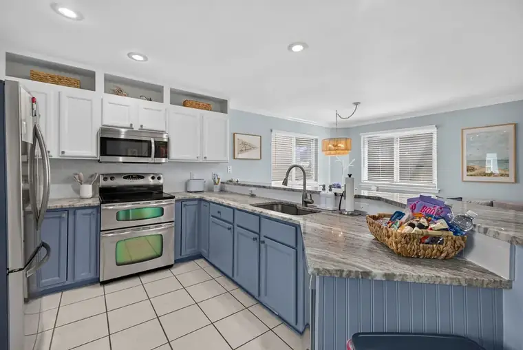 Renovated kitchen with stainless appliances